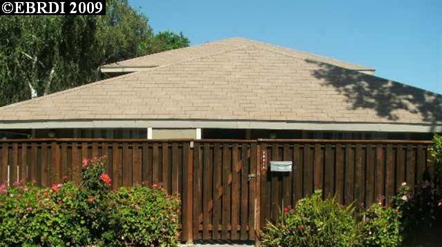 2031 Olivera Road, Unit A Concord, CA 94520 - Photo 1 of 1 a terrace with wooden fence