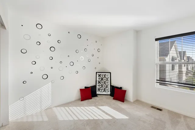 a bedroom with furniture and window