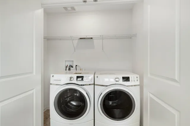 a utility room with dryer and washer