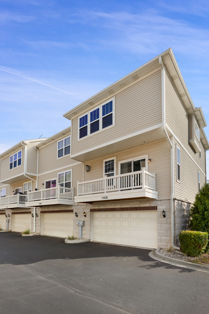 1108 Evergreen Avenue Des Plaines, IL 60016 - Photo 18 of 20 a front view of a building with balcony