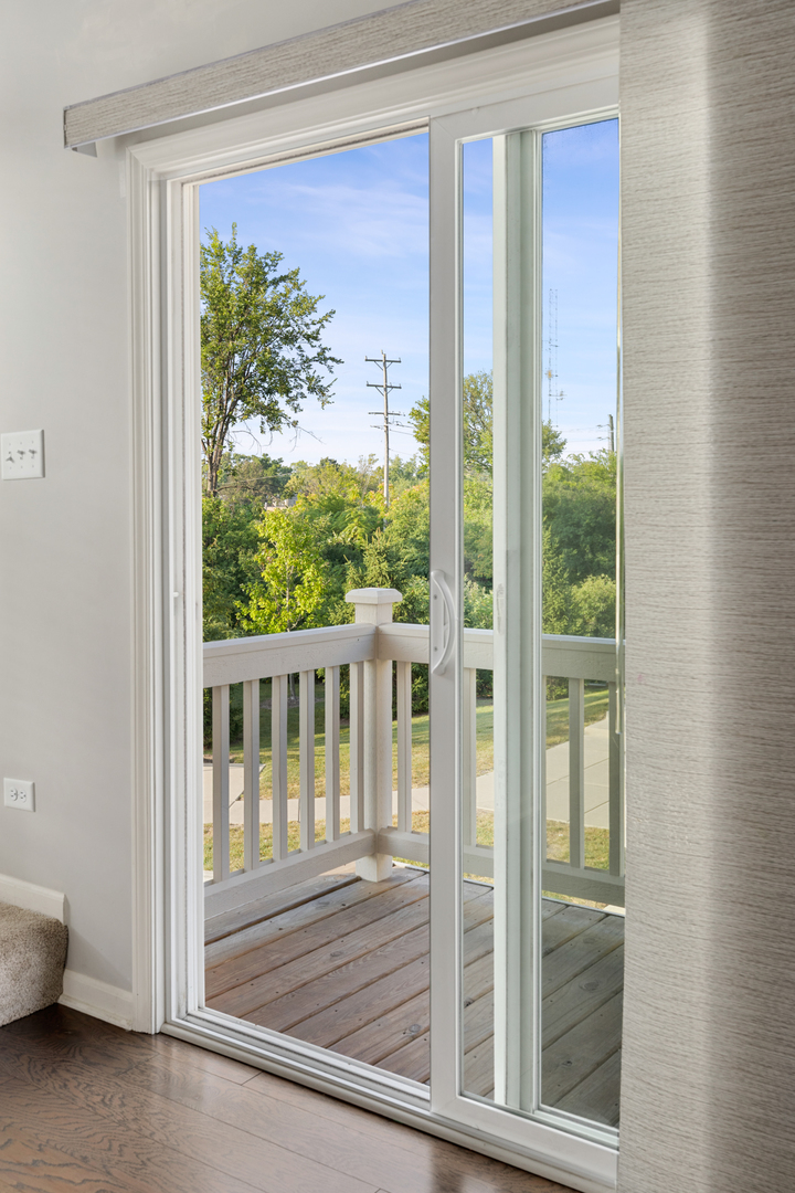 1108 Evergreen Avenue Des Plaines, IL 60016 - Photo 8 of 20 a view of a porch with a floor to ceiling window