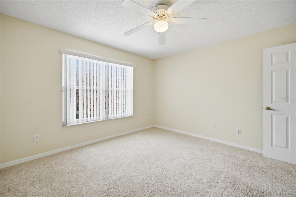 632 Blenheim Loop Winter Springs, FL 32708 - Photo 16 of 55 an empty room with a window