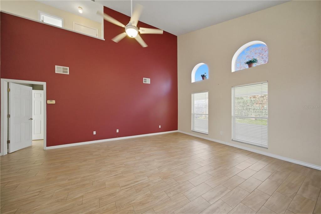 632 Blenheim Loop Winter Springs, FL 32708 - Photo 37 of 55 a view of a livingroom with wooden floor and window