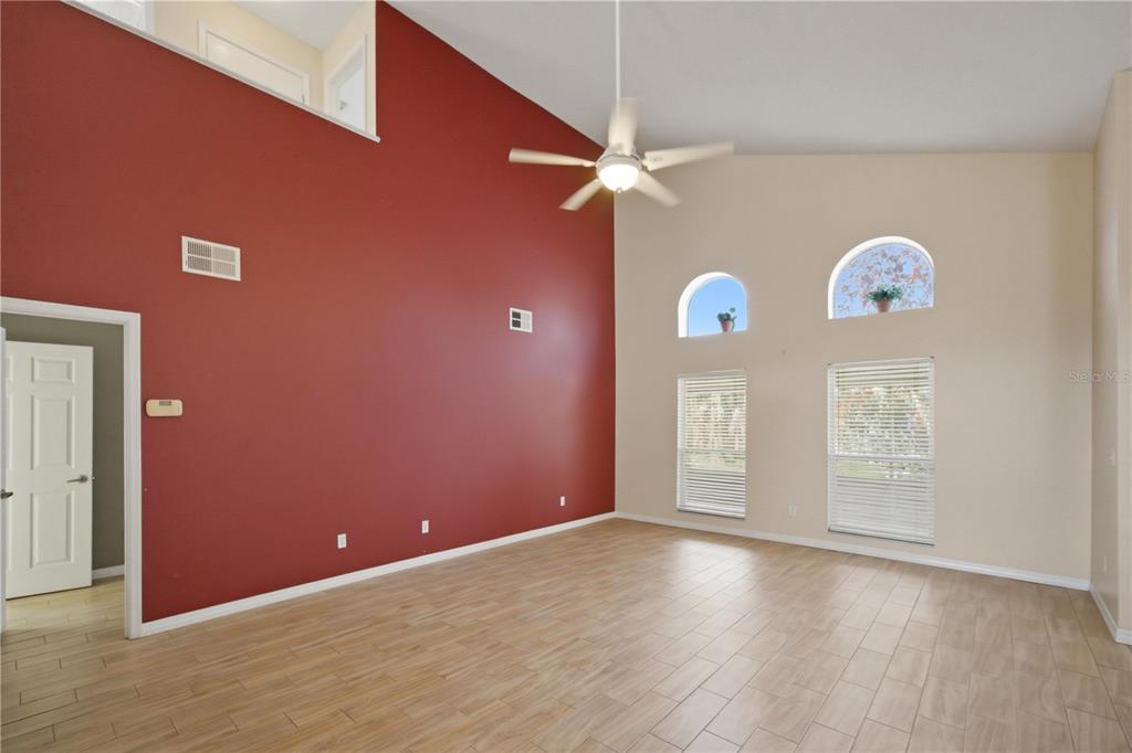 632 Blenheim Loop Winter Springs, FL 32708 - Photo 38 of 55 an empty room with windows and fan