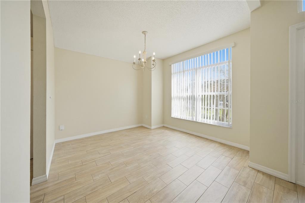 632 Blenheim Loop Winter Springs, FL 32708 - Photo 41 of 55 a view of an empty room with a window