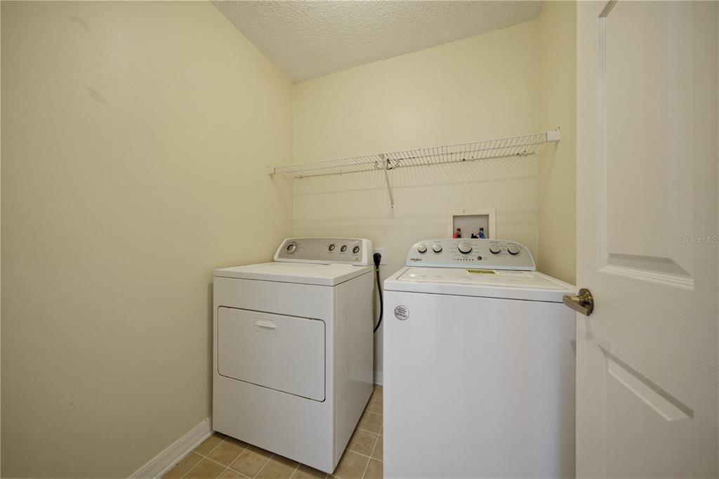 632 Blenheim Loop Winter Springs, FL 32708 - Photo 42 of 55 a utility room with dryer and washer