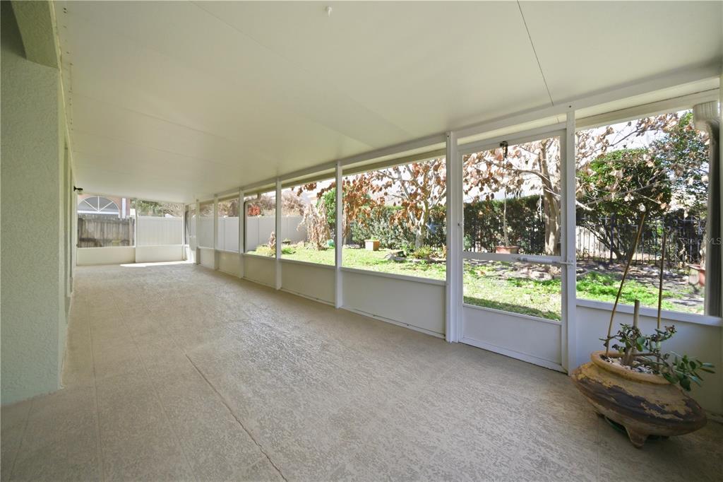 632 Blenheim Loop Winter Springs, FL 32708 - Photo 47 of 55 a living room with furniture and a large window