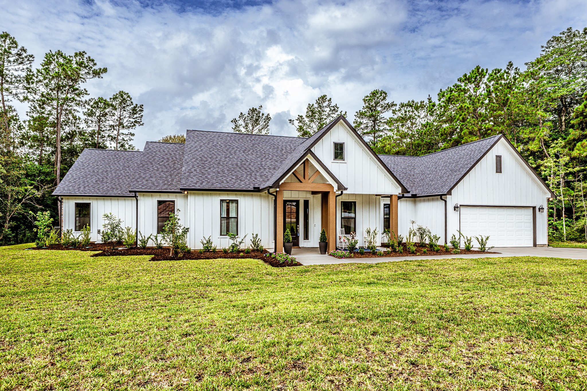 111 Eagle Run Road Willis, TX 77378 - Photo 1 of 44 Stunning custom home with a guest house on a spacious 1-acre lot, offering privacy and luxury living.