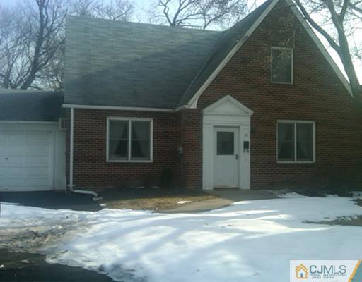 19 Old Post Road Edison, NJ 08817 - Photo 1 of 22 a front view of a house