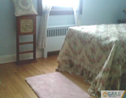19 Old Post Road Edison, NJ 08817 - Photo 11 of 22 a view of balcony with wooden floor
