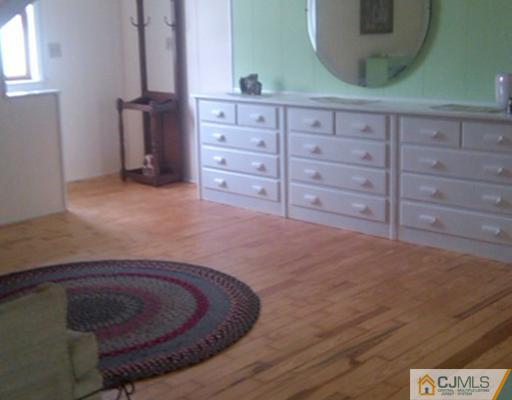 19 Old Post Road Edison, NJ 08817 - Photo 14 of 22 a view of a dresser