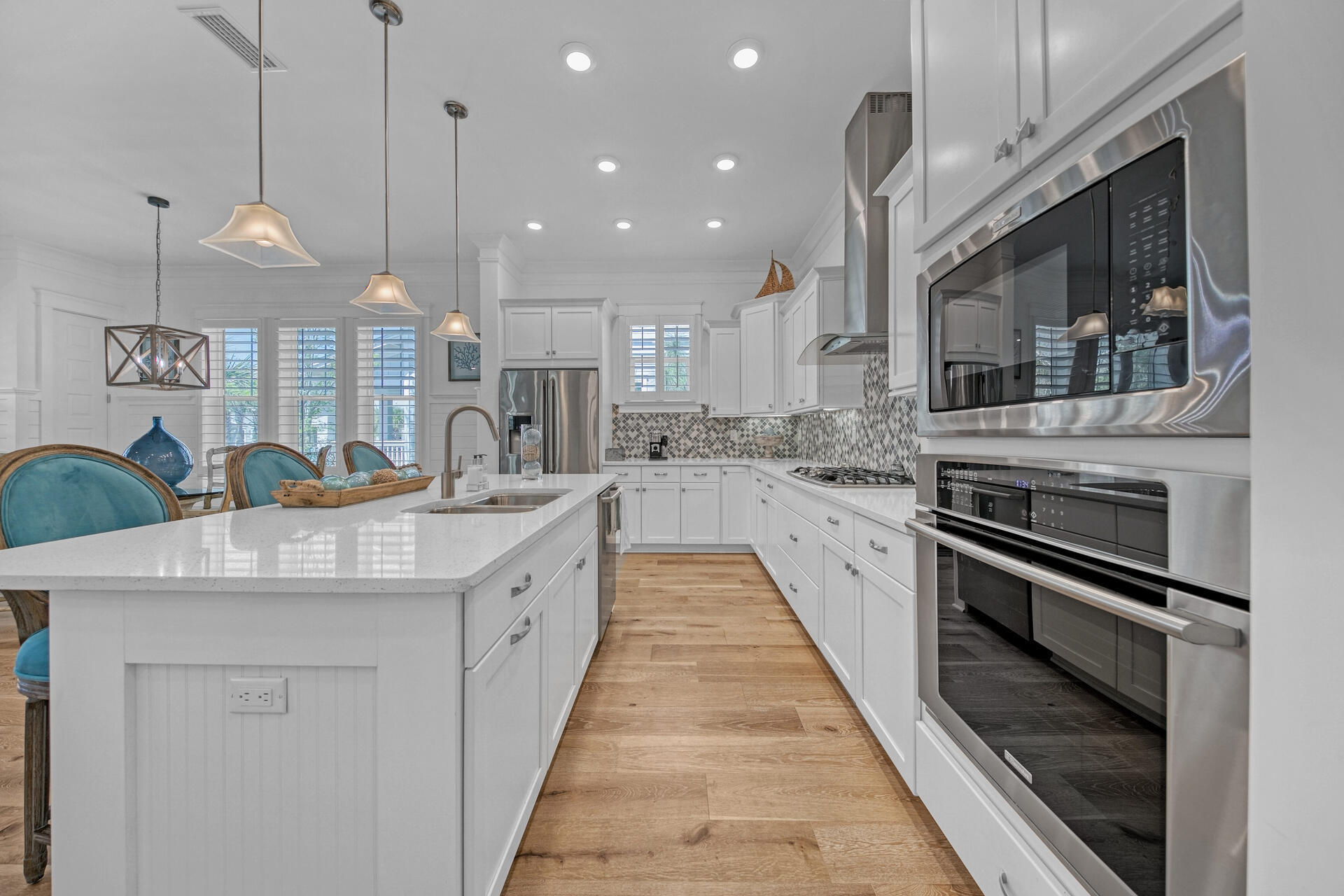 41 Clipper Street Inlet Beach, FL 32461 - Photo 15 of 48 a large kitchen with stainless steel appliances kitchen island a large stove a sink a oven and a kitchen island