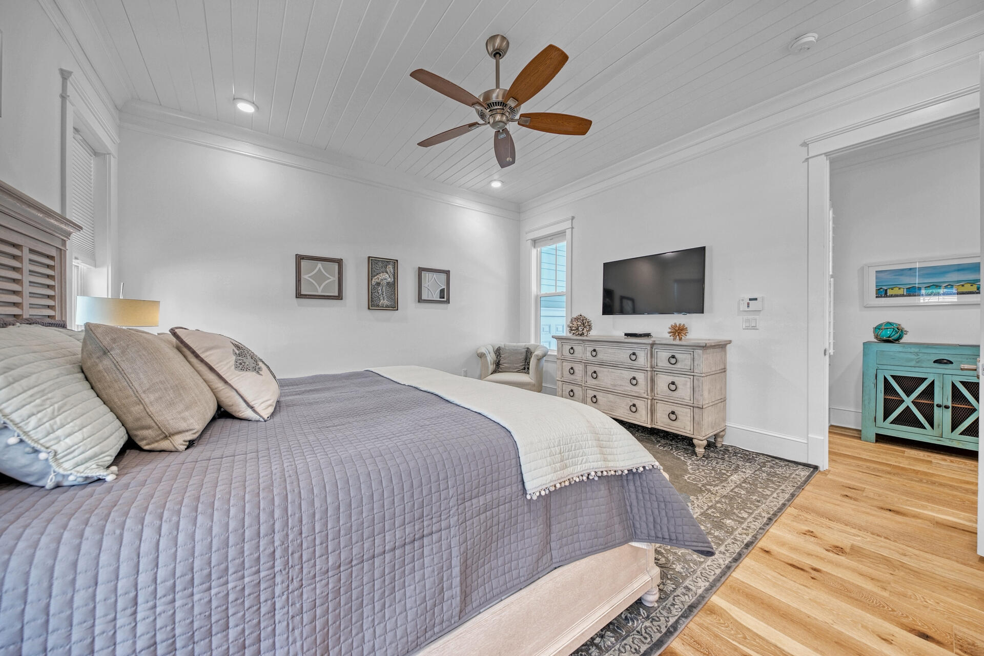 41 Clipper Street Inlet Beach, FL 32461 - Photo 20 of 48 a bedroom with a bed window and a flat screen tv