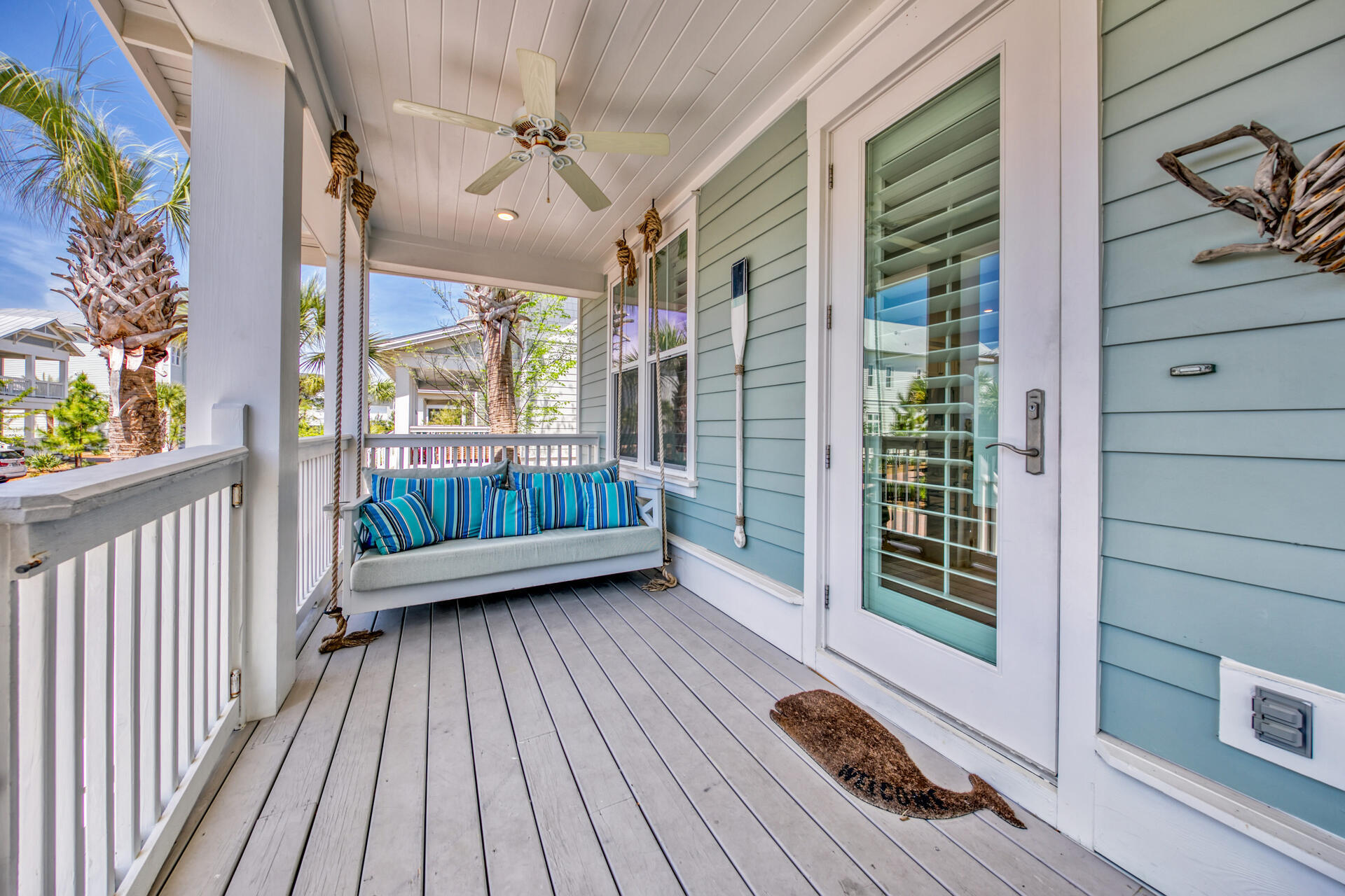 41 Clipper Street Inlet Beach, FL 32461 - Photo 2 of 48 a view of a balcony with furniture and wooden floor