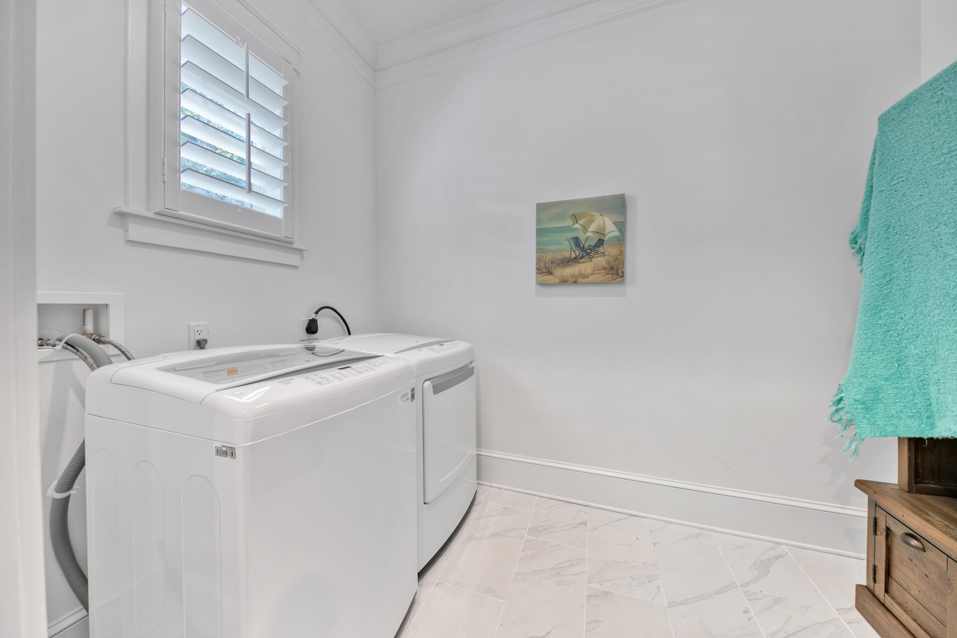 41 Clipper Street Inlet Beach, FL 32461 - Photo 24 of 48 a utility room with dryer and washer