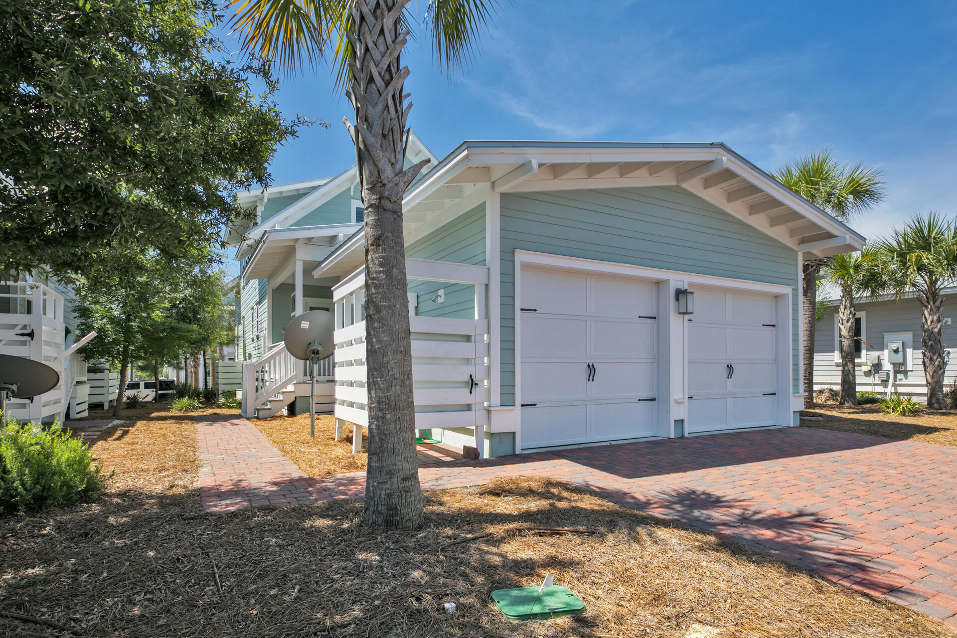 41 Clipper Street Inlet Beach, FL 32461 - Photo 30 of 48 a front view of a house with a yard and garage