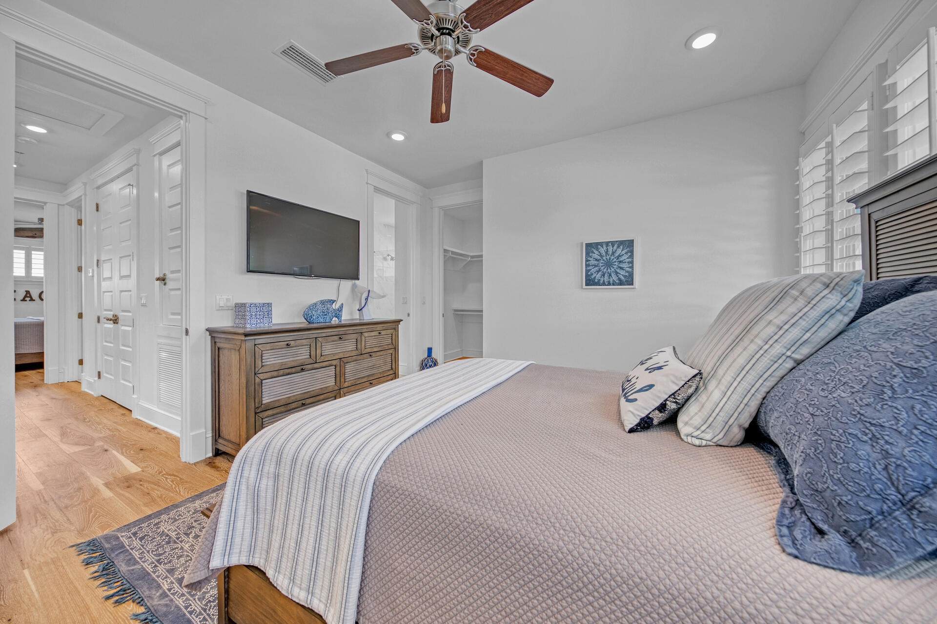 41 Clipper Street Inlet Beach, FL 32461 - Photo 33 of 48 a bedroom with a bed and a flat screen tv