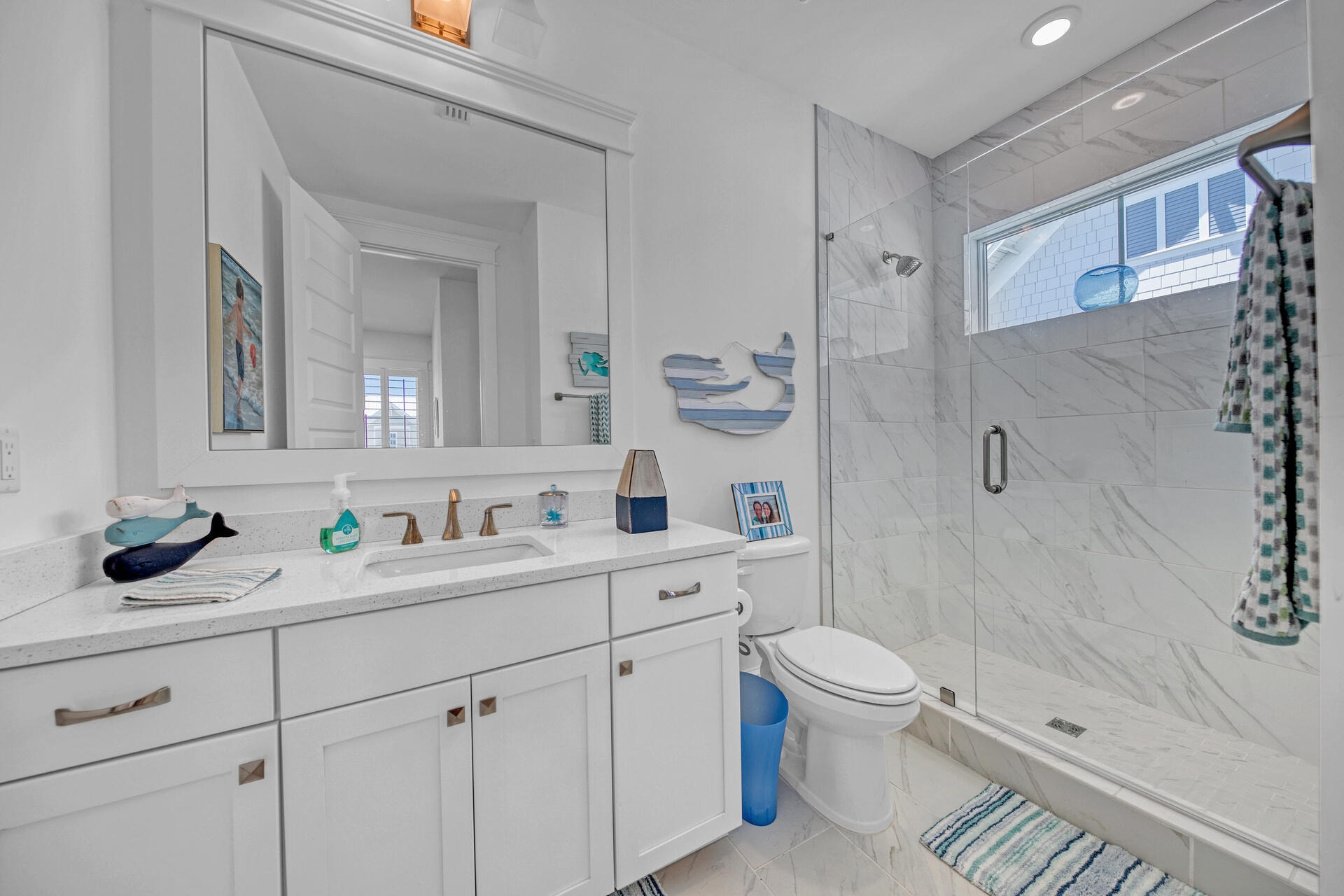 41 Clipper Street Inlet Beach, FL 32461 - Photo 35 of 48 a bathroom with a granite countertop sink a toilet and a mirror