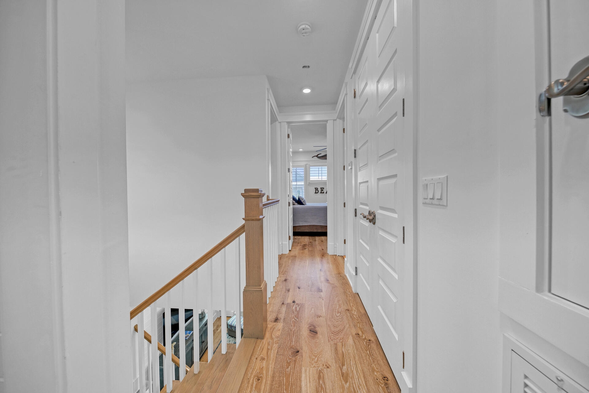 41 Clipper Street Inlet Beach, FL 32461 - Photo 36 of 48 a view of a hallway with wooden floor and stairs