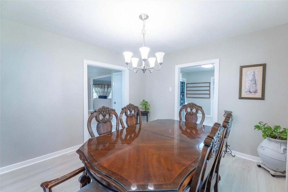 2118 Rolling Hills Road Conroe, TX 77303 - Photo 13 of 39 A welcoming dining space ready for everything from casual breakfasts to holiday celebrations.