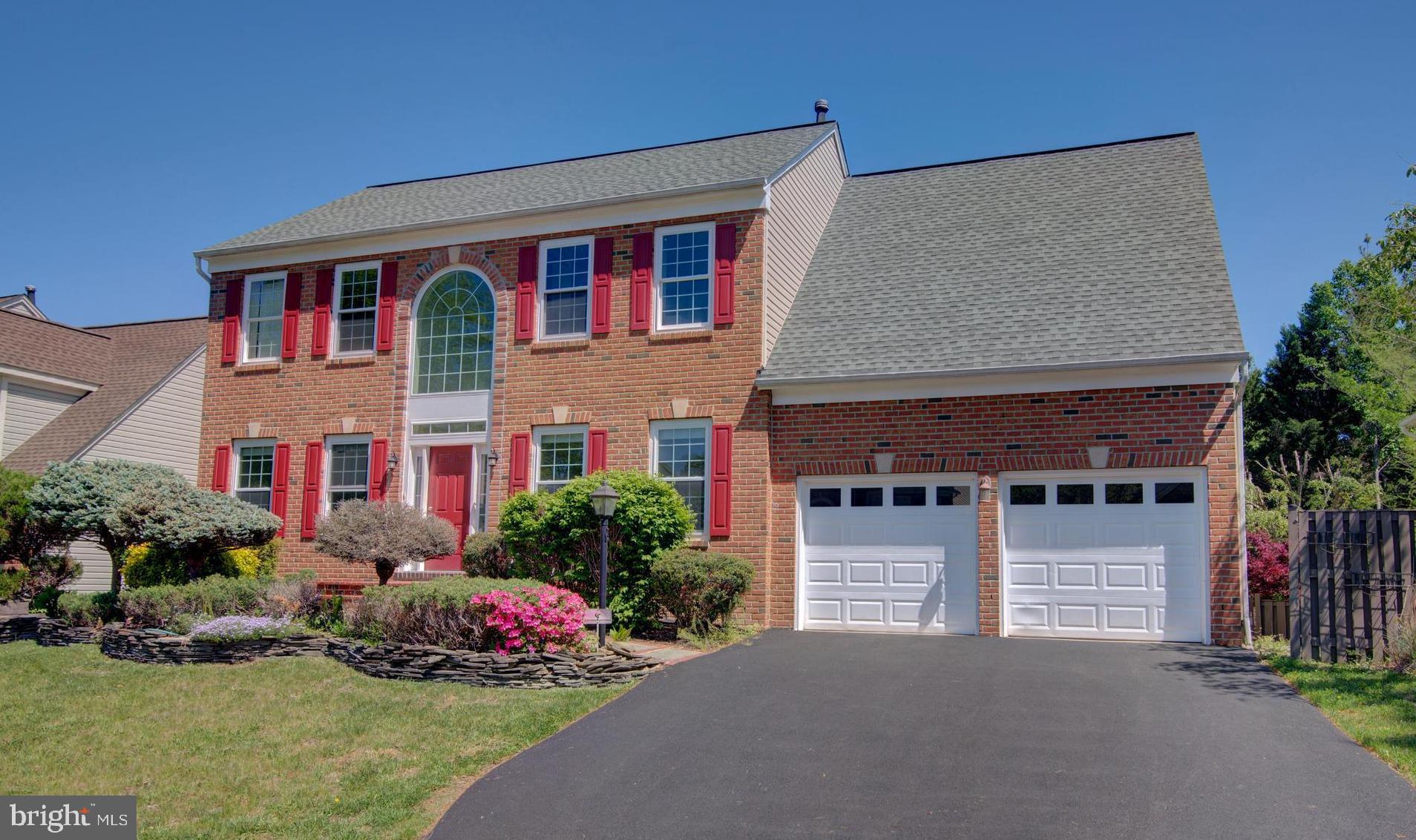 6137 Deer Ridge Trail Springfield, VA 22150 - Photo 1 of 1 a front view of house with yard