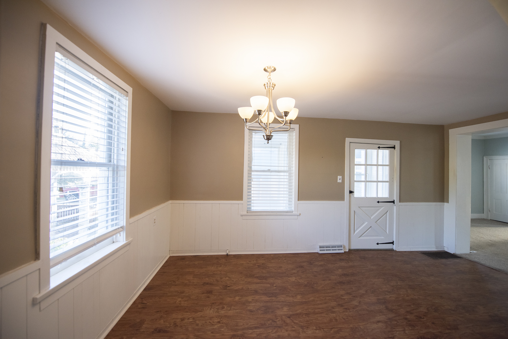 716 Locust Street Sterling, IL 61081 - Photo 18 of 27 a view of an empty room with a window