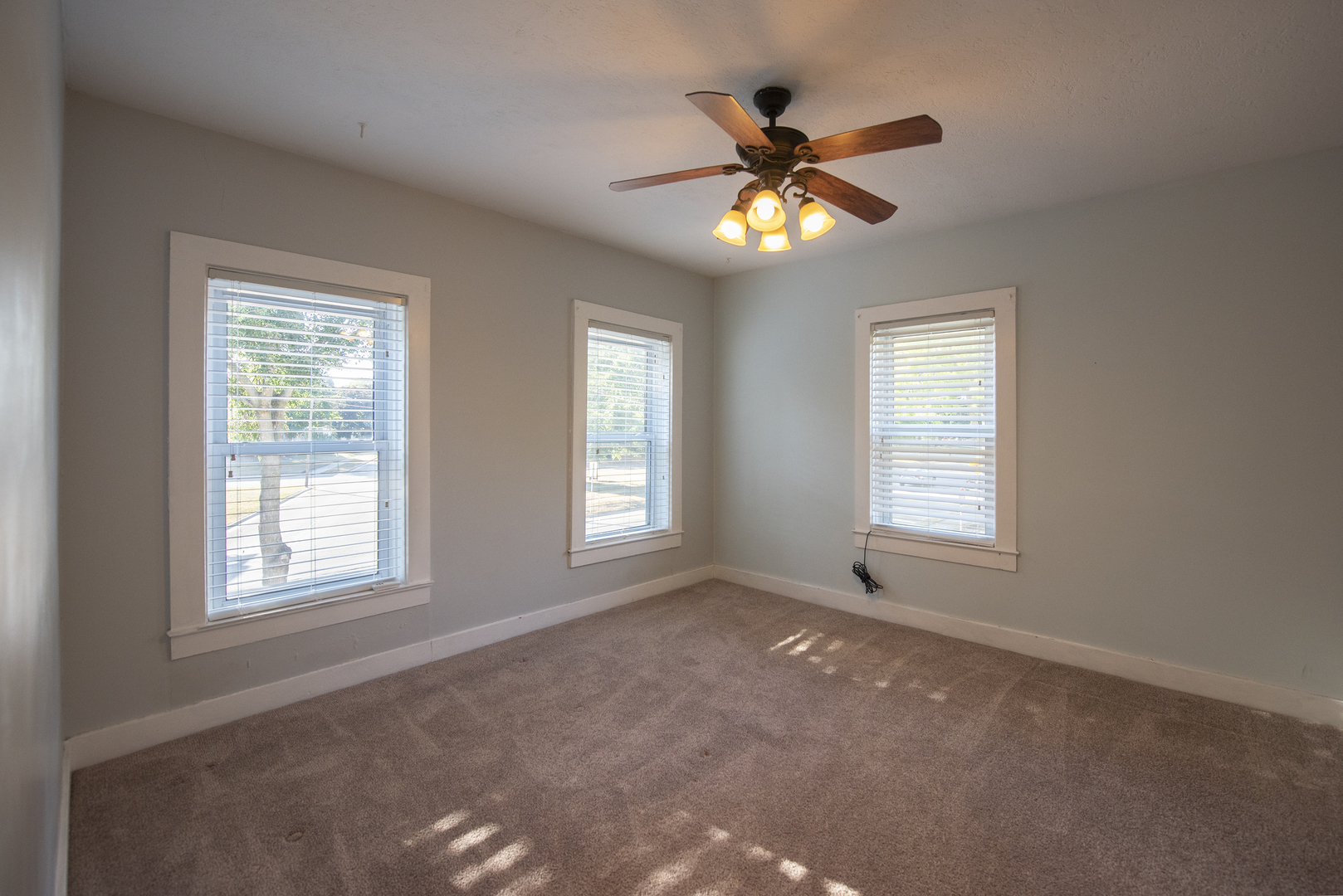 716 Locust Street Sterling, IL 61081 - Photo 22 of 27 a view of an empty room with a window
