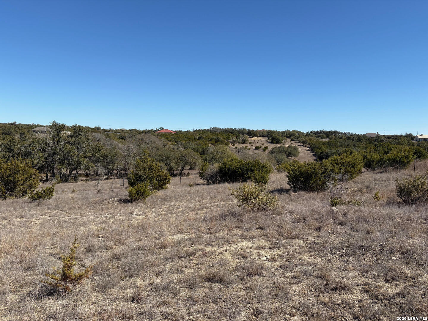 552-lot 2002) Rock Trail Spring Branch, TX 78070 - Photo 11 of 39 a view of a covered with trees in the background