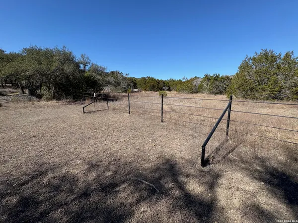 a view of a yard with a slide