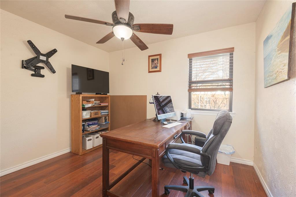 2005 Inverness Drive Carrollton, TX 75007 - Photo 15 of 25 a view of a workspace with furniture and a window