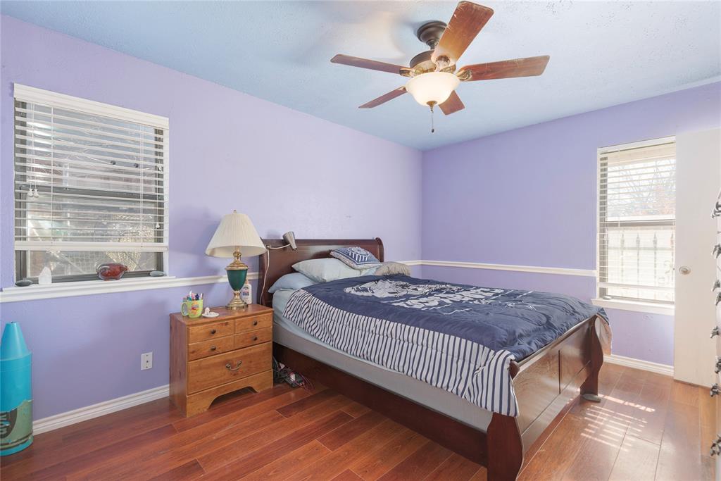 2005 Inverness Drive Carrollton, TX 75007 - Photo 16 of 25 a bed room with a bed and a window