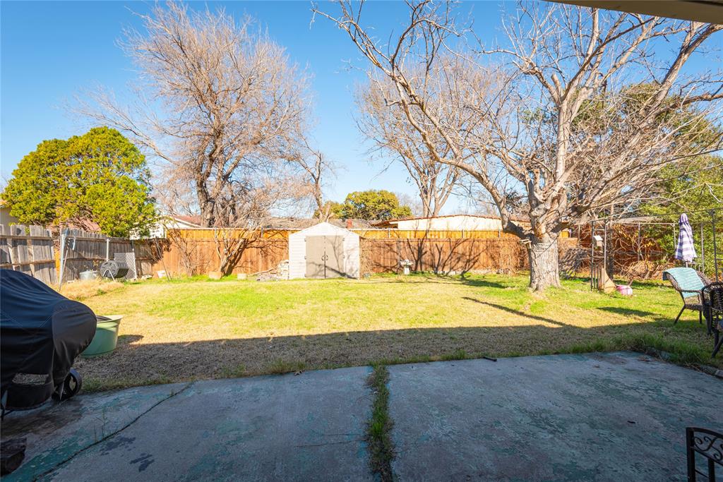 2005 Inverness Drive Carrollton, TX 75007 - Photo 24 of 25 a view of the yard and basketball court
