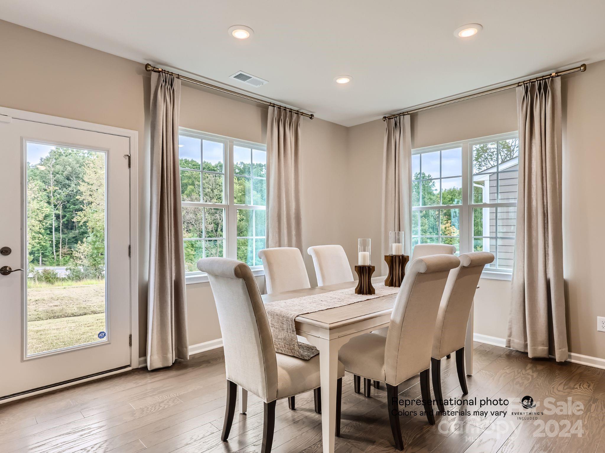 4468 Doyle Rdg Road Maiden, NC 28650 - Photo 5 of 16 a view of a dining room with furniture and wooden floor