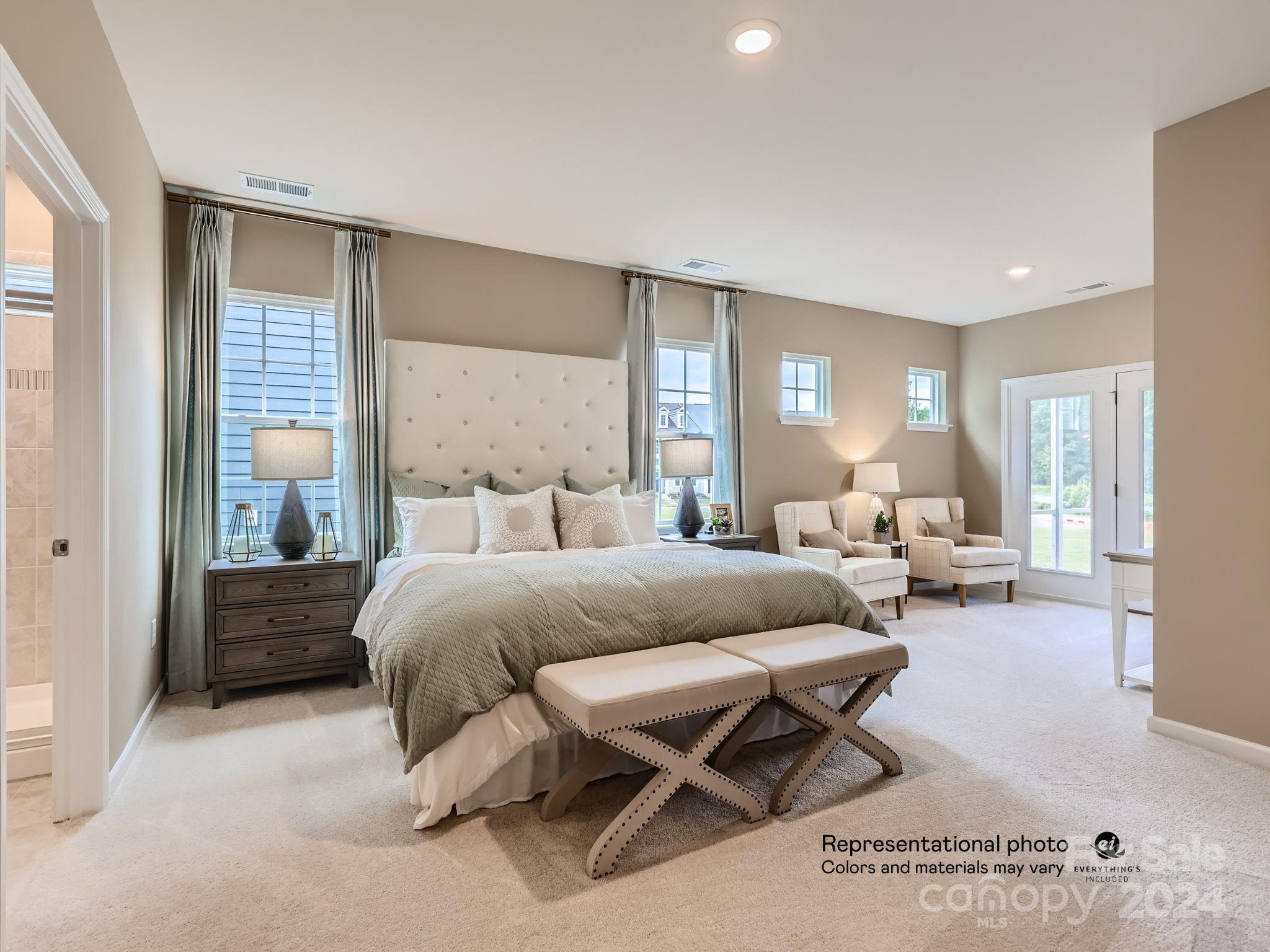 4468 Doyle Rdg Road Maiden, NC 28650 - Photo 9 of 16 a spacious bedroom with a bed and glass windows
