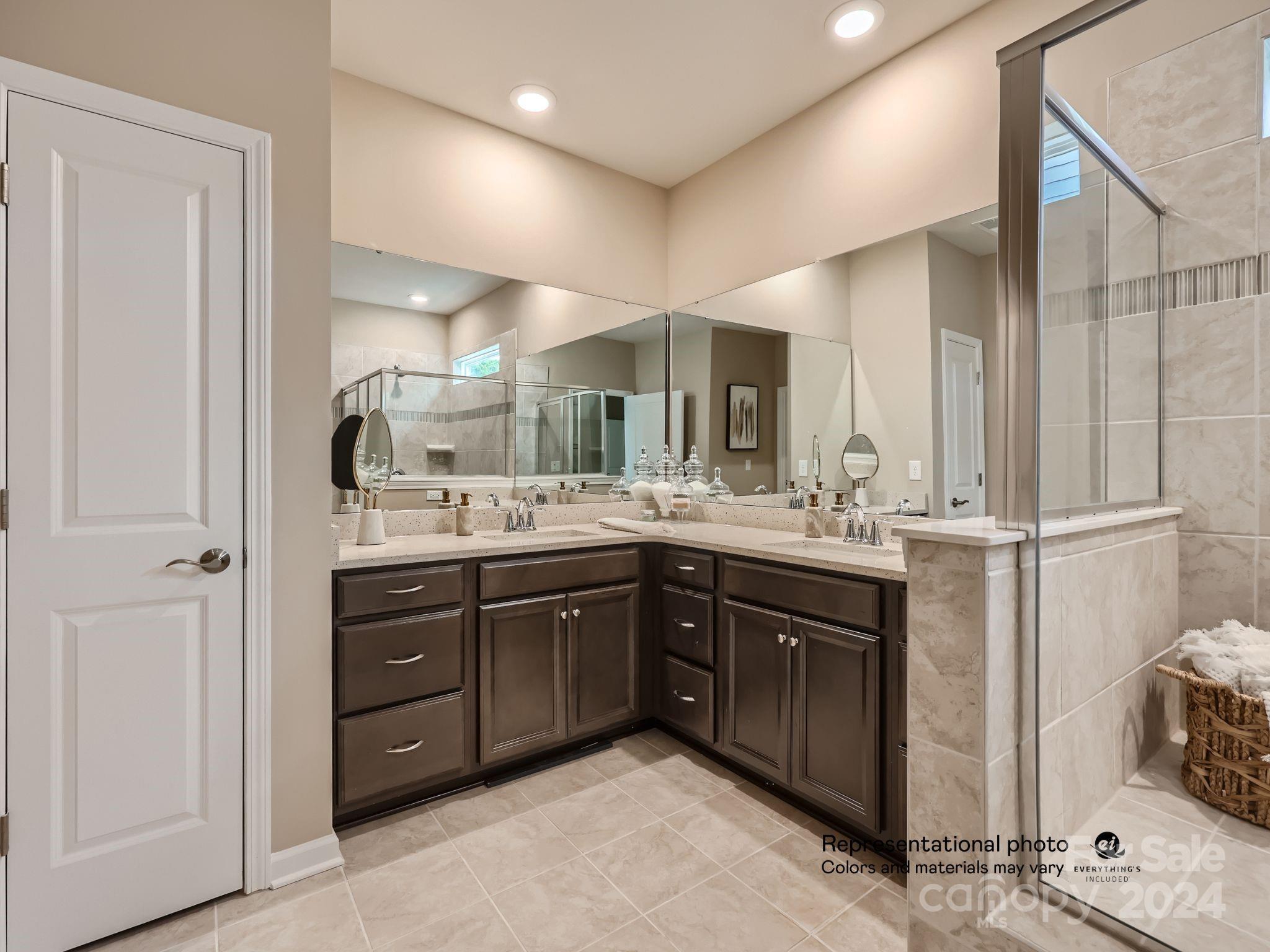 4468 Doyle Rdg Road Maiden, NC 28650 - Photo 10 of 16 a bathroom with a double vanity sink and mirror
