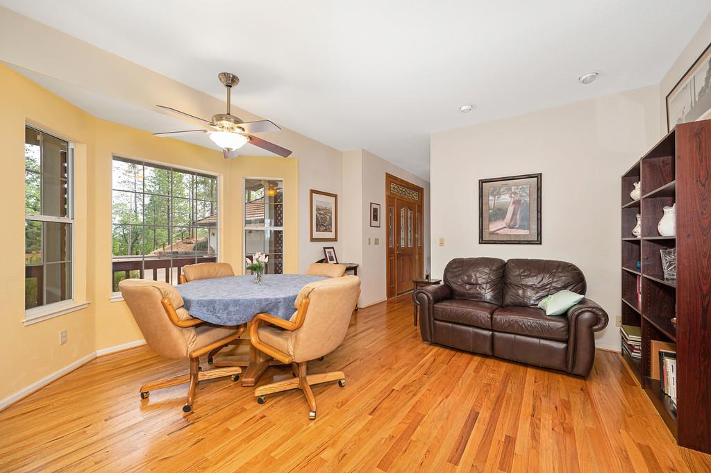 2358 Deer Ravine Court Cool, CA 95614 - Photo 9 of 63 dining area featuring light wood-style flooring and ceiling fan