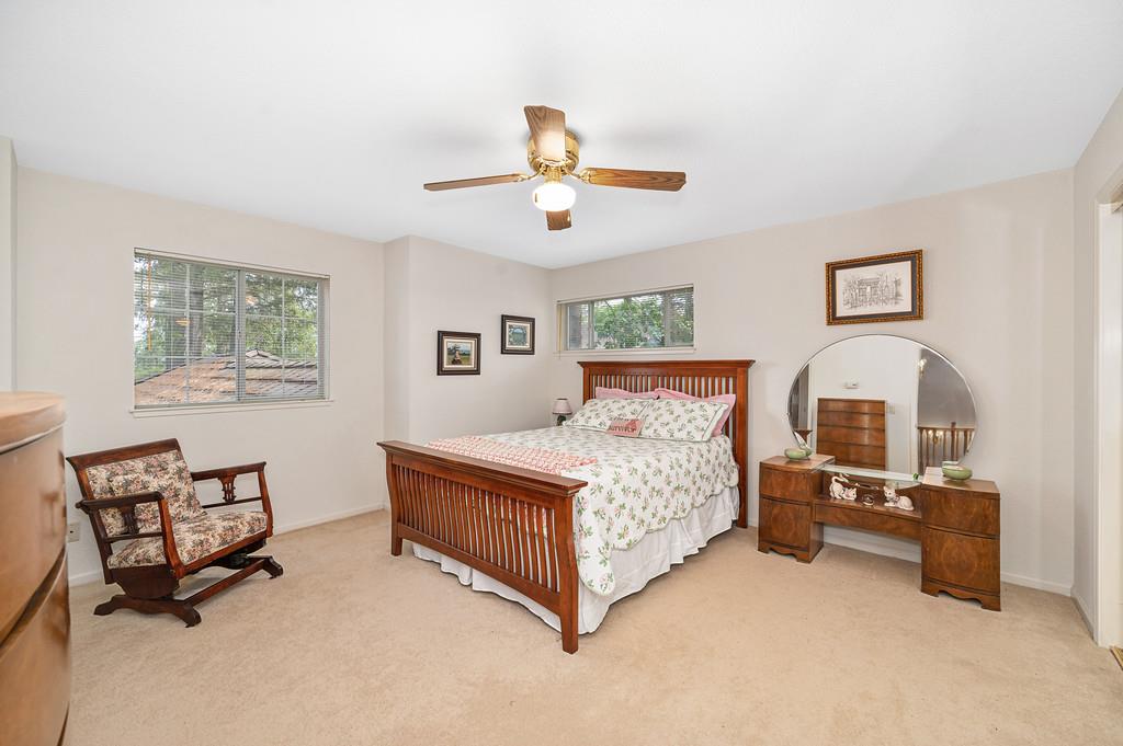 2358 Deer Ravine Court Cool, CA 95614 - Photo 21 of 63 upstair large bedroom with light carpet and ceiling fan