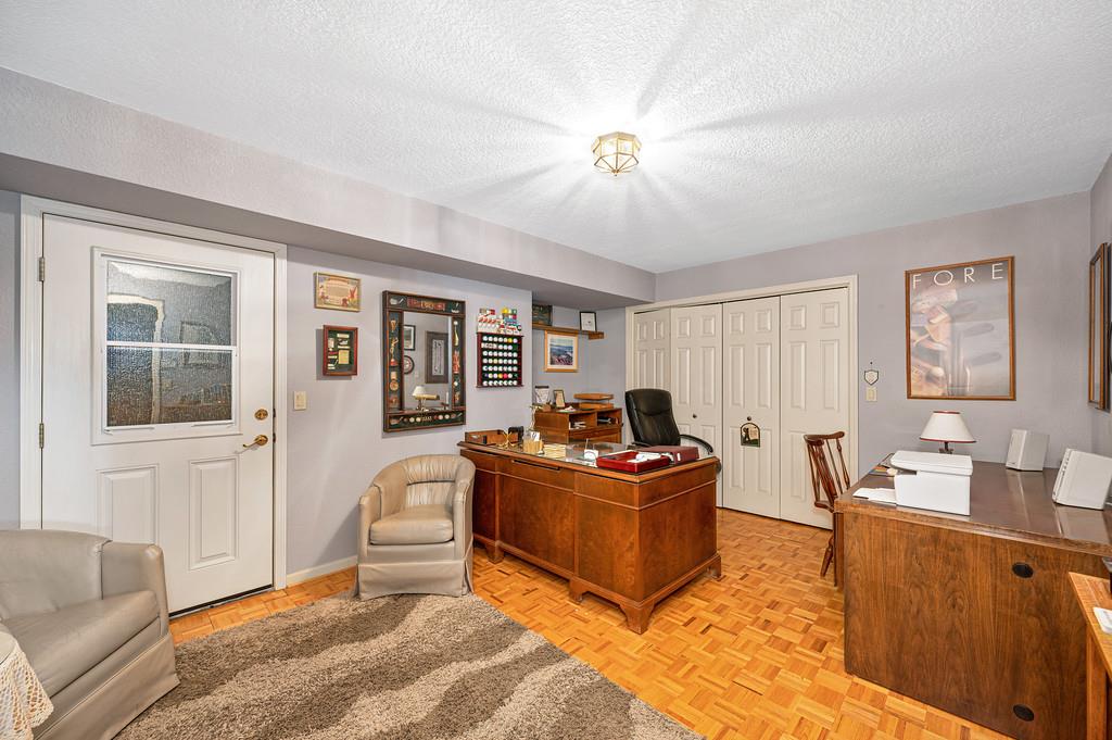 2358 Deer Ravine Court Cool, CA 95614 - Photo 29 of 63 spacious office featuring a textured ceiling and parquet flooring, located downstairs.