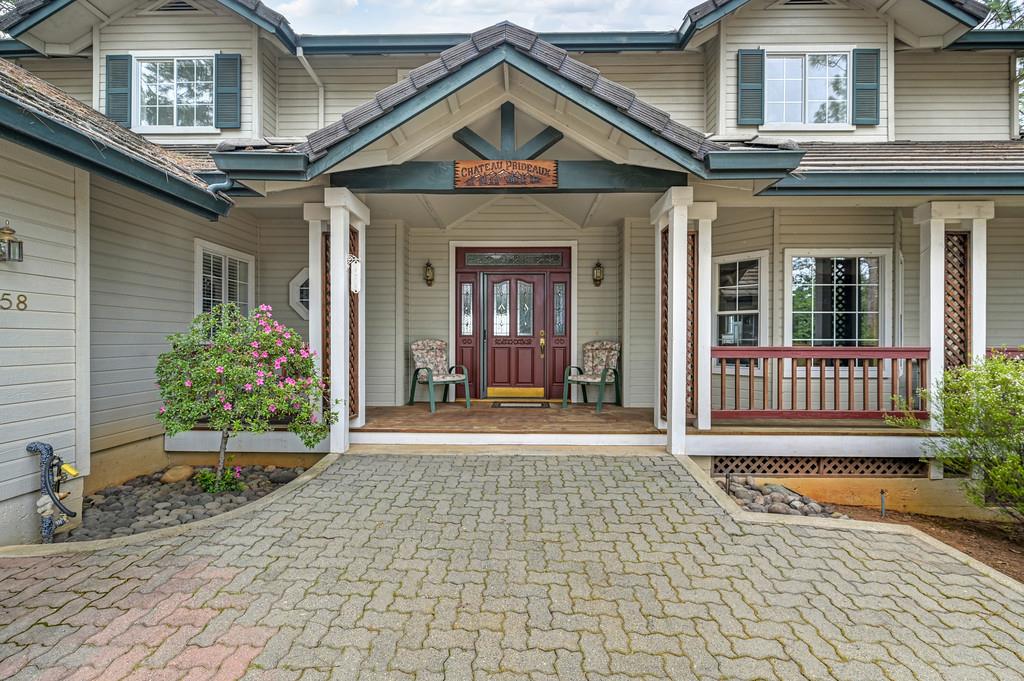 2358 Deer Ravine Court Cool, CA 95614 - Photo 4 of 63 view of exterior entry with a porch
