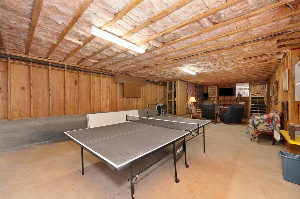2358 Deer Ravine Court Cool, CA 95614 - Photo 40 of 63 bonus/storage room with finished concrete floors and wood walls