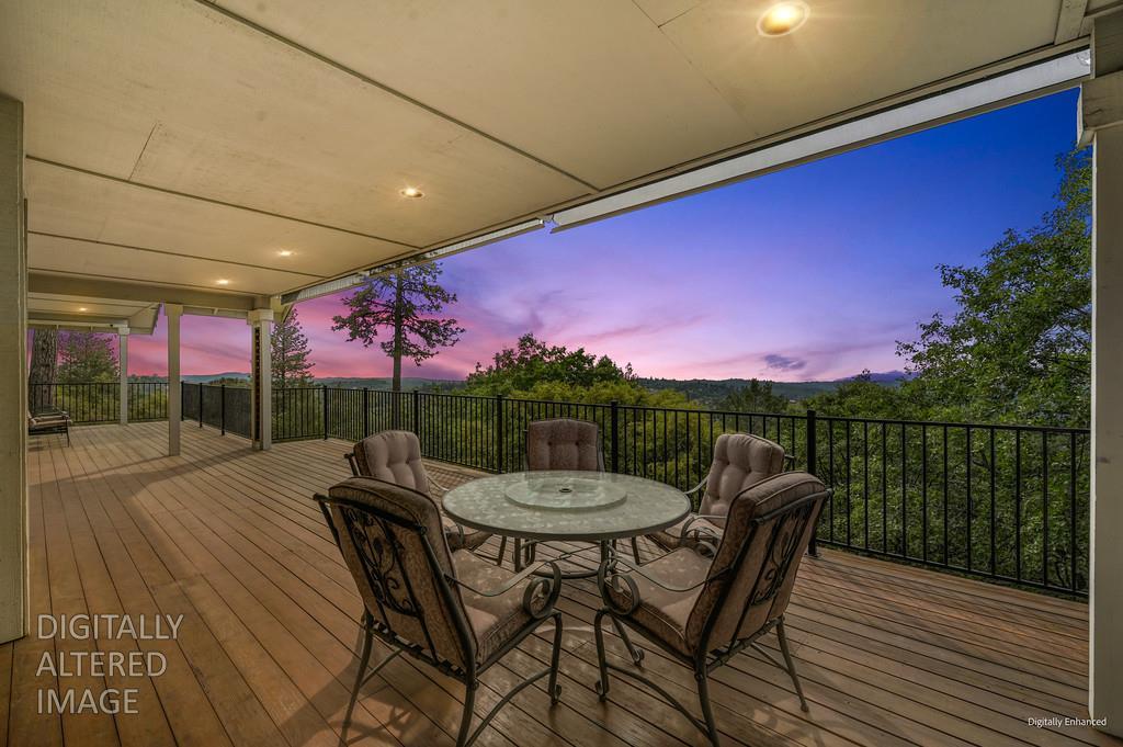 2358 Deer Ravine Court Cool, CA 95614 - Photo 50 of 63 wooden deck with outdoor dining area