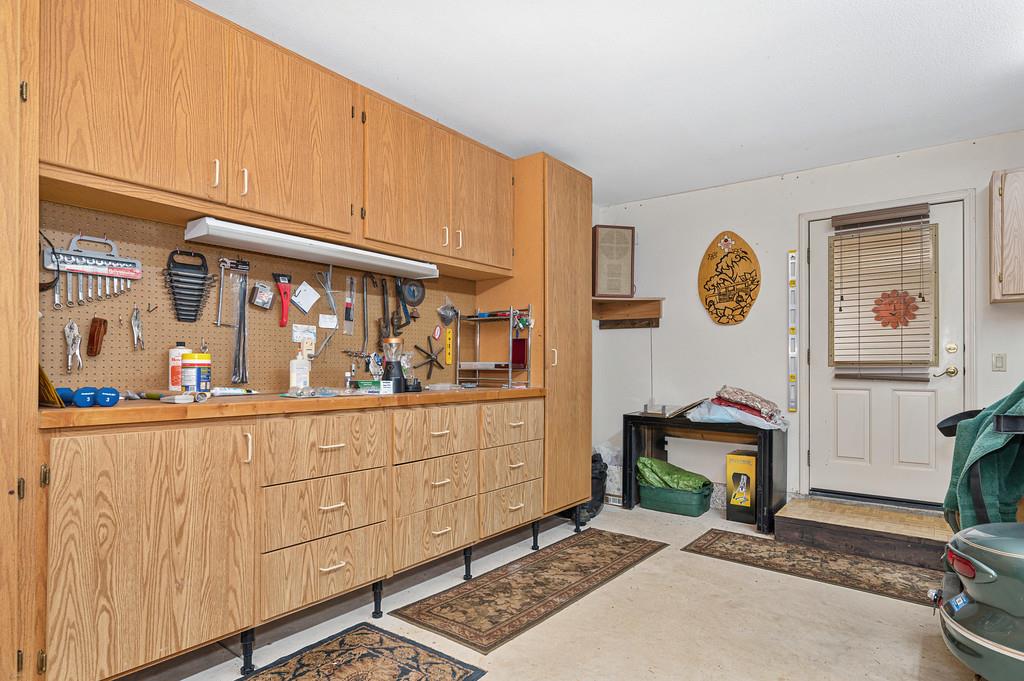 2358 Deer Ravine Court Cool, CA 95614 - Photo 57 of 63 garage workshop area with concrete floors