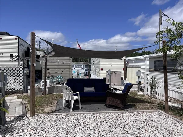 a view of a terrace with furniture