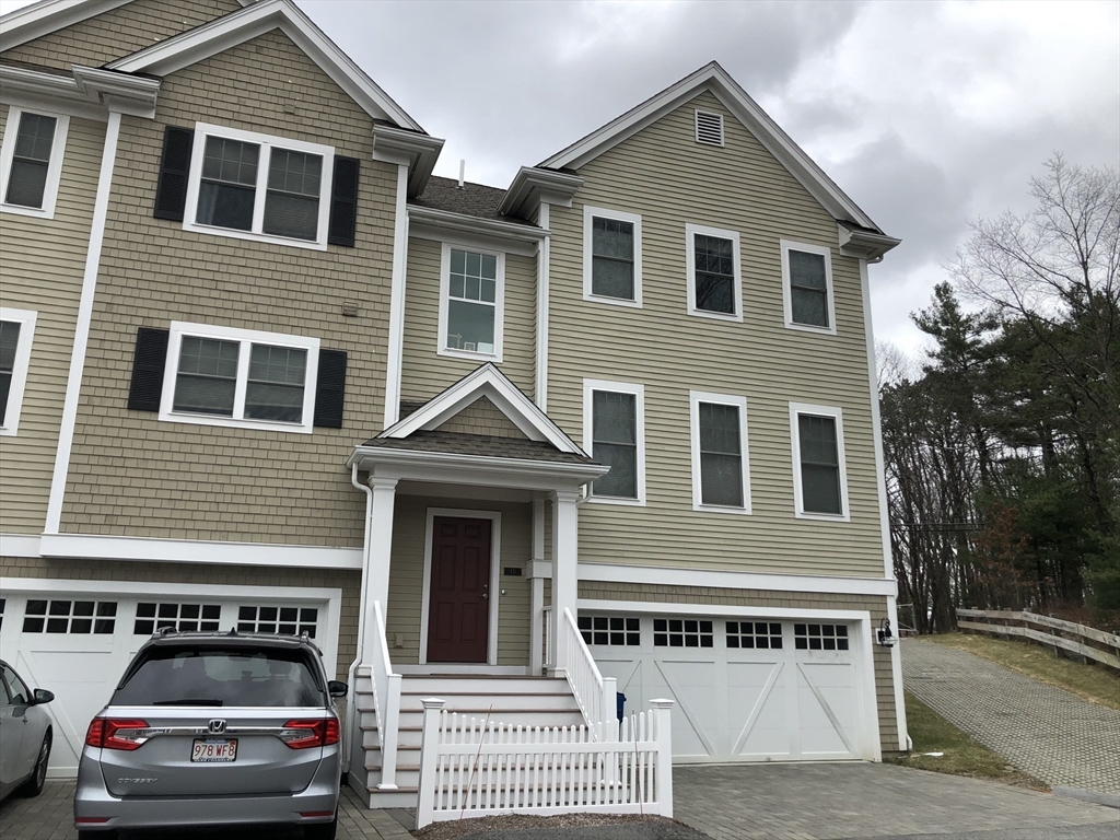 4 Reserve Way, Unit D Burlington, MA 01803 - Photo 2 of 17 a view of a house with a car park