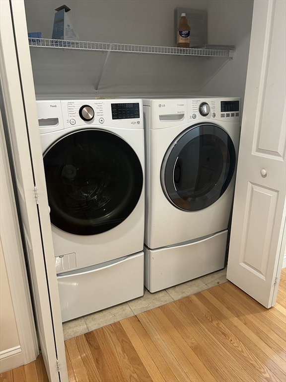 4 Reserve Way, Unit D Burlington, MA 01803 - Photo 9 of 17 a utility room with dryer and washer