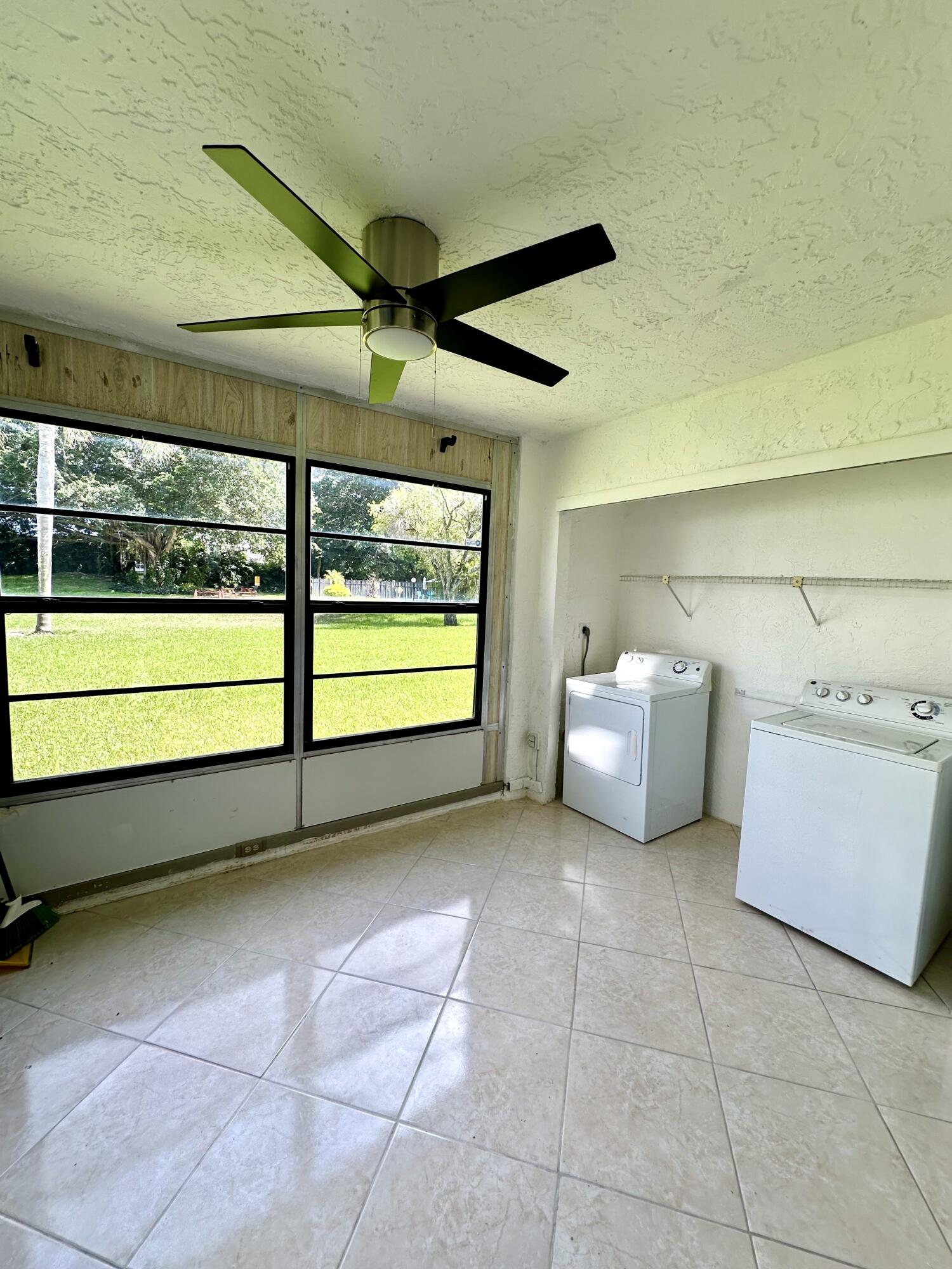 9440 Southwest 8th Street, Unit 109 Boca Raton, FL 33428 - Photo 11 of 14 a view of a room with storage and utility