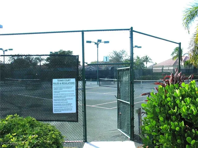 a view of a fence in the city