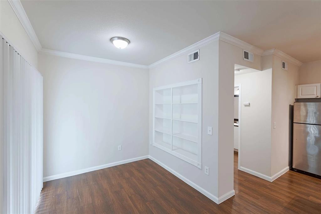 10505 I-35 Frontage Road South, Unit 118 Austin, TX 78747 - Photo 5 of 24 a view of empty room with wooden floor