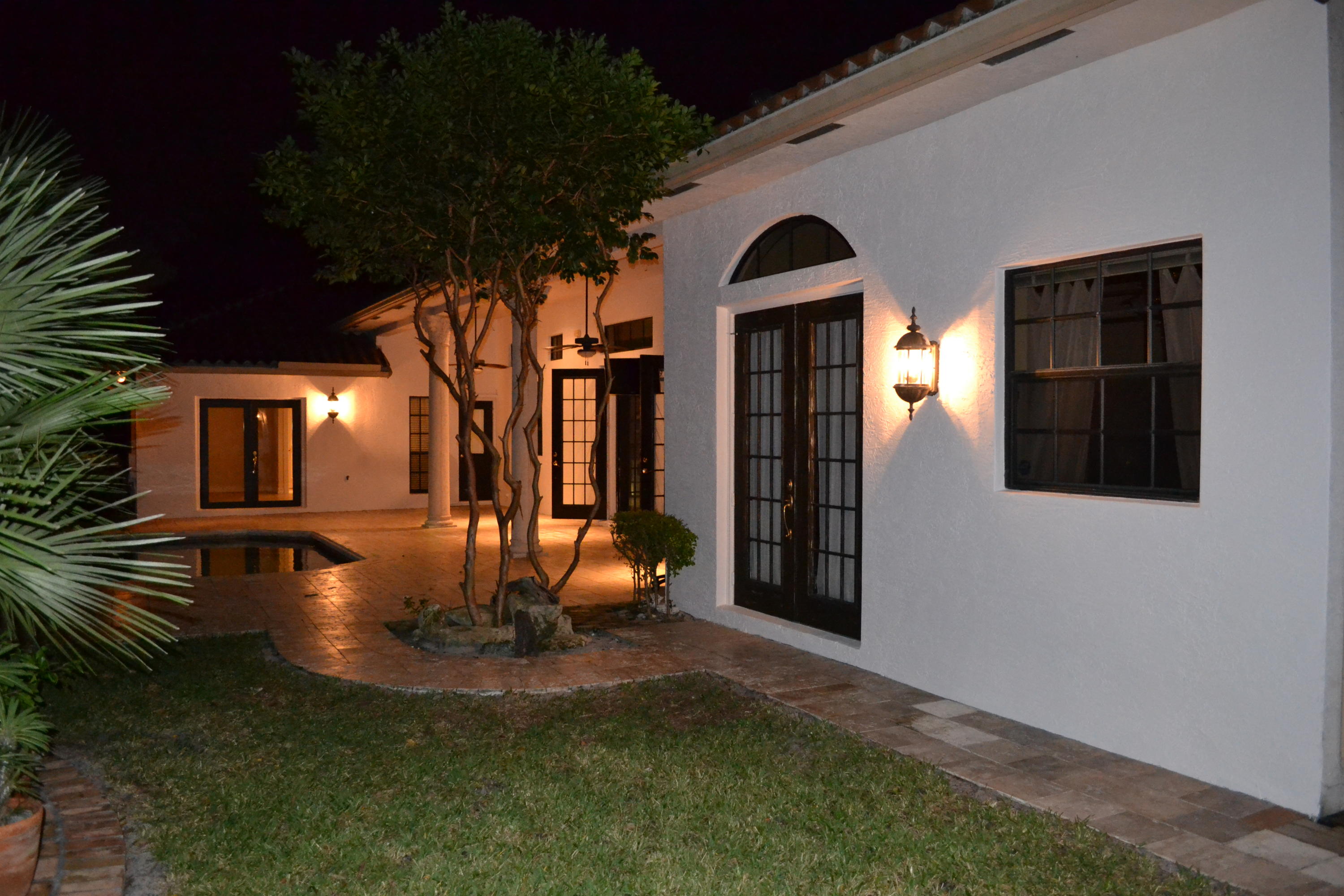 1495 Addison Avenue Boca Raton, FL 33486 - Photo 20 of 46 Exterior Night Backyard 1