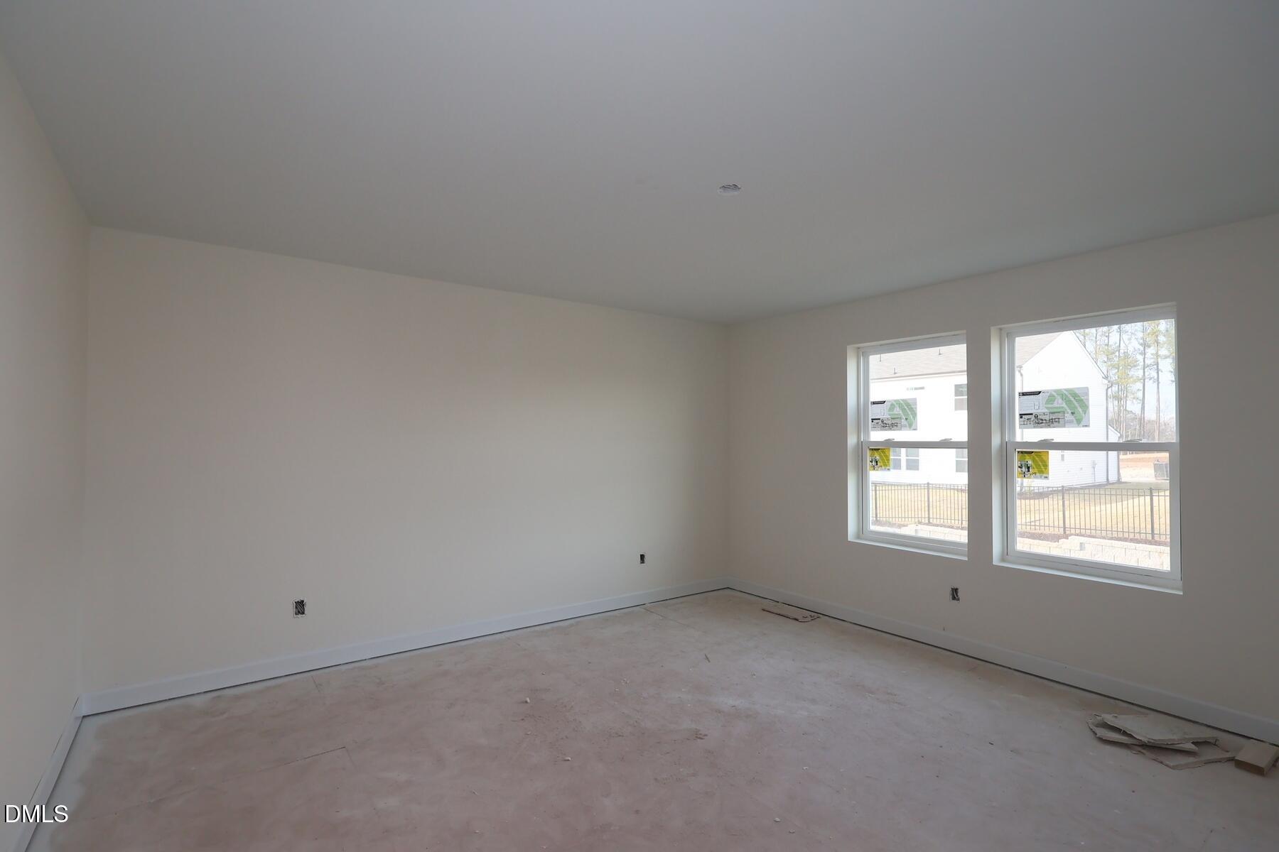 1321 Dimaggio Drive Raleigh, NC 27616 - Photo 13 of 28 a view of an empty room with a window